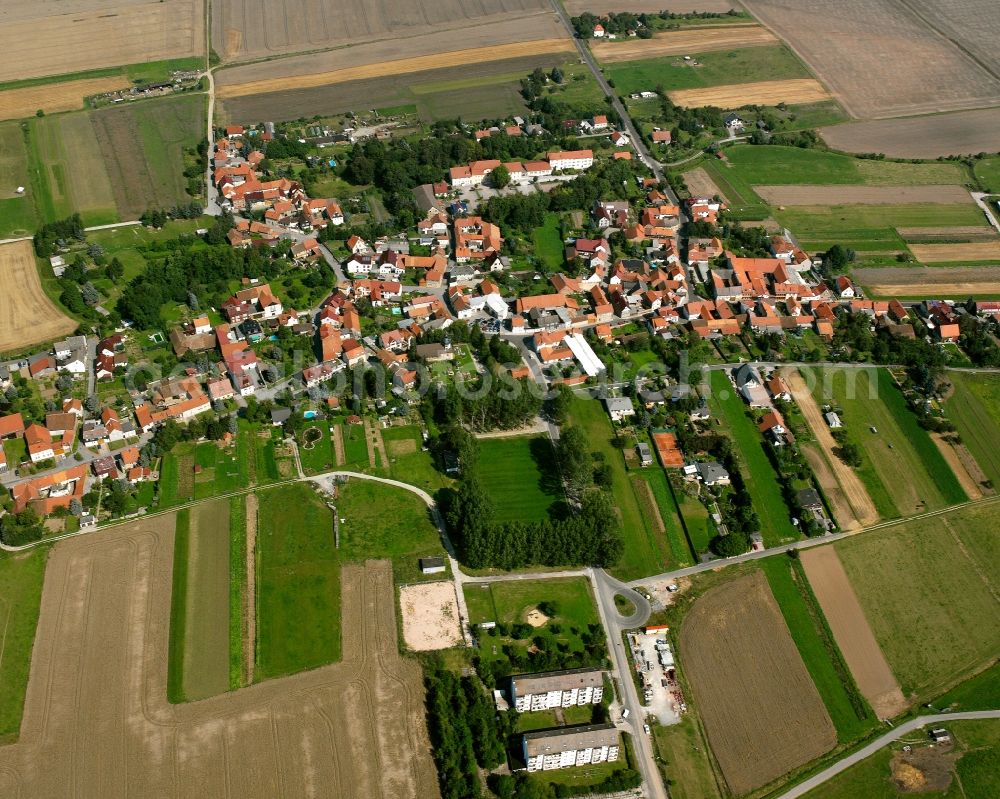 Aerial image Felchta - Agricultural land and field boundaries surround the settlement area of the village in Felchta in the state Thuringia, Germany