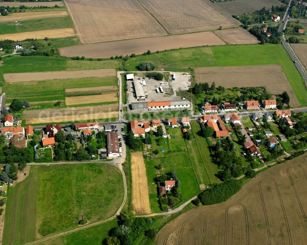 Aerial photograph Felchta - Agricultural land and field boundaries surround the settlement area of the village in Felchta in the state Thuringia, Germany