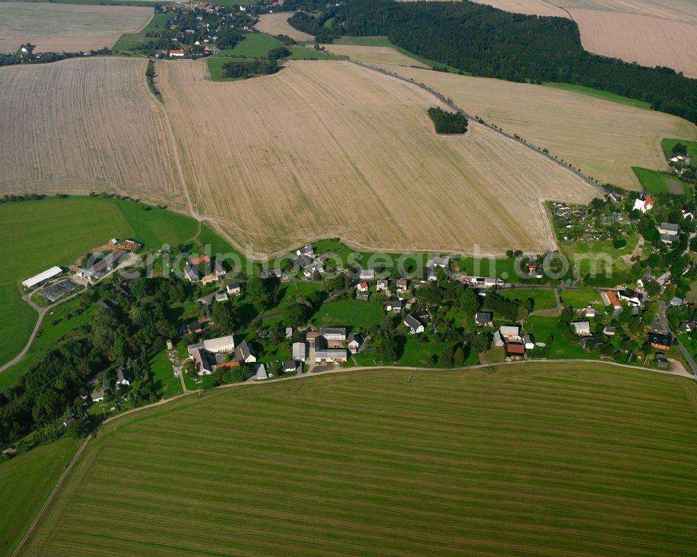 Frankenstein from above - Agricultural land and field boundaries surround the settlement area of the village in Frankenstein in the state Saxony, Germany