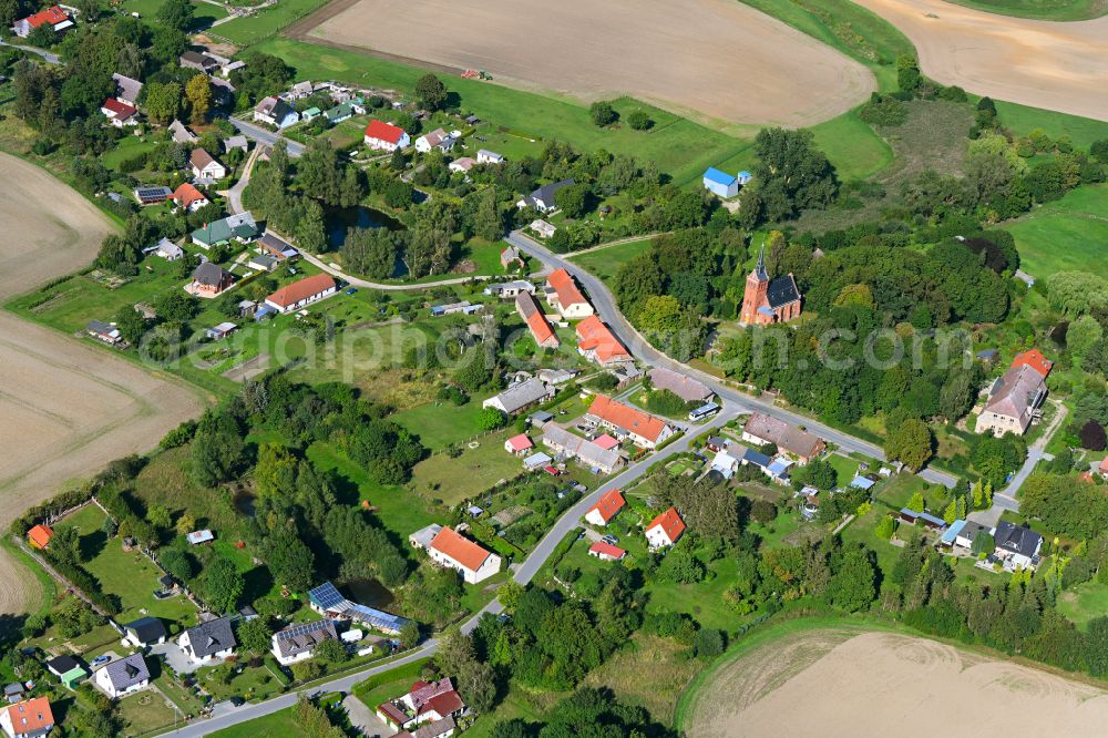 Aerial image Ganschendorf - Agricultural land and field boundaries surround the settlement area of the village in Ganschendorf in the state Mecklenburg - Western Pomerania, Germany