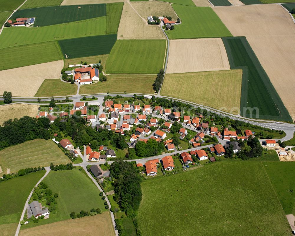 Gasteig from above - Agricultural land and field boundaries surround the settlement area of the village in Gasteig in the state Bavaria, Germany