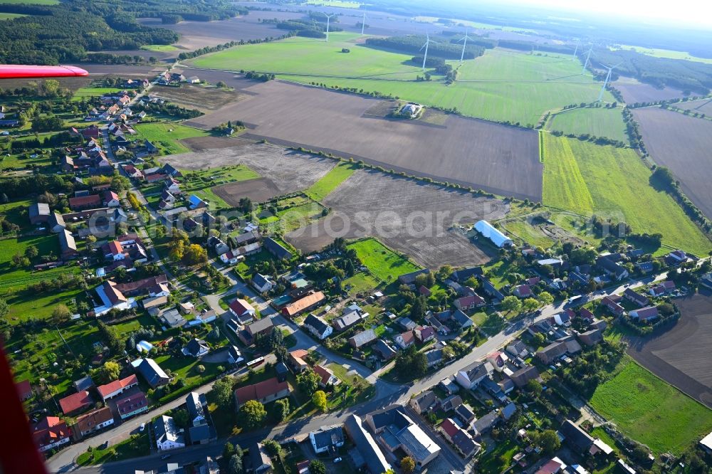 Aerial image Glienicke - Agricultural land and field boundaries surround the settlement area of the village in Glienicke in the state Brandenburg, Germany