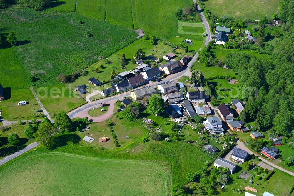 Aerial photograph Godendorf - Agricultural land and field boundaries surround the settlement area of the village in Godendorf in the state Mecklenburg - Western Pomerania, Germany