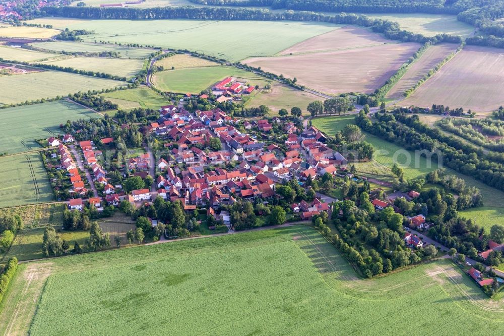 Aerial photograph Gospiteroda - Agricultural land and field boundaries surround the settlement area of the village in Gospiteroda in the state Thuringia, Germany