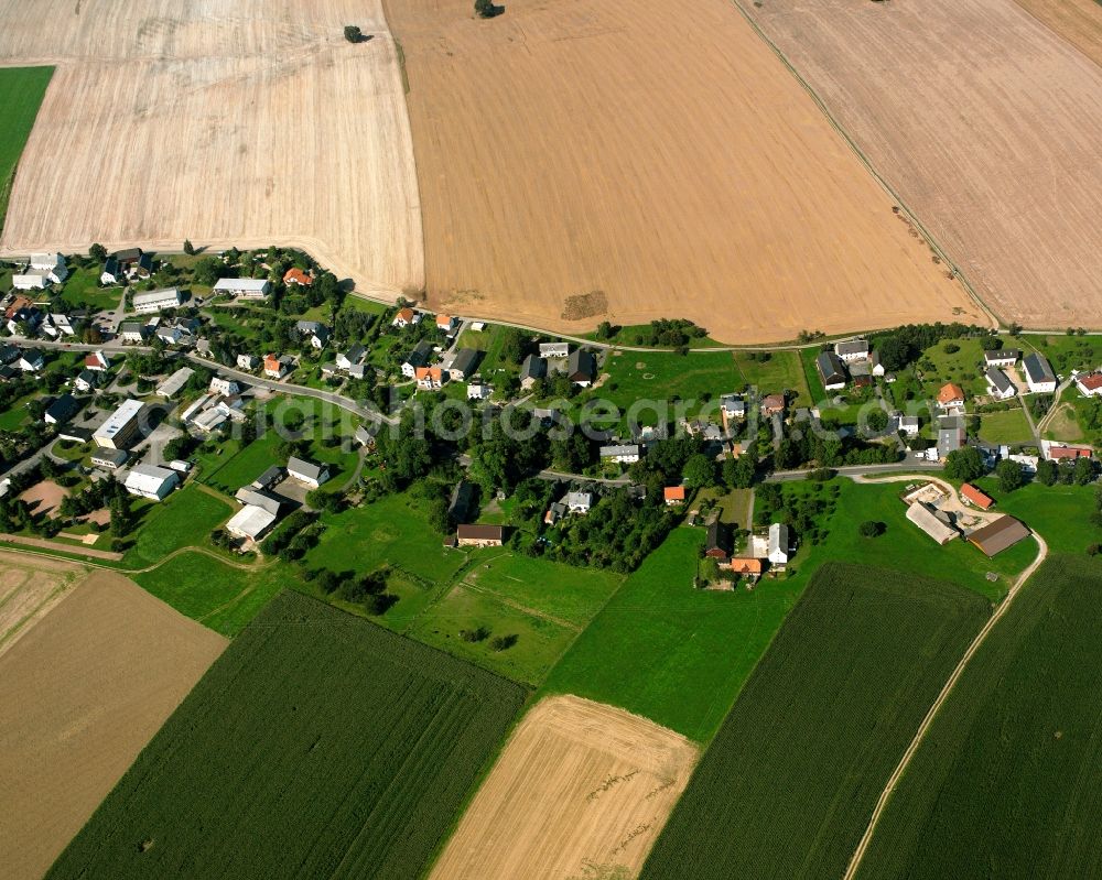 Aerial photograph Großschirma - Agricultural land and field boundaries surround the settlement area of the village in Großschirma in the state Saxony, Germany