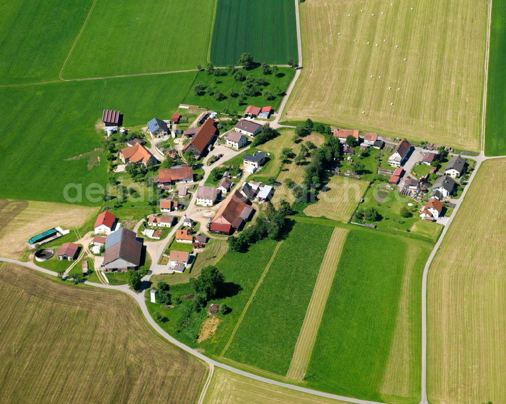 Aerial photograph Gutenzell-Hürbel - Agricultural land and field boundaries surround the settlement area of the village in Gutenzell-Hürbel in the state Baden-Wuerttemberg, Germany