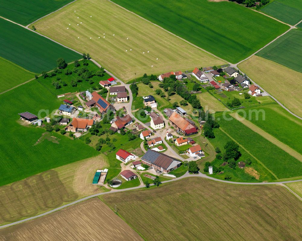 Gutenzell-Hürbel from above - Agricultural land and field boundaries surround the settlement area of the village in Gutenzell-Hürbel in the state Baden-Wuerttemberg, Germany
