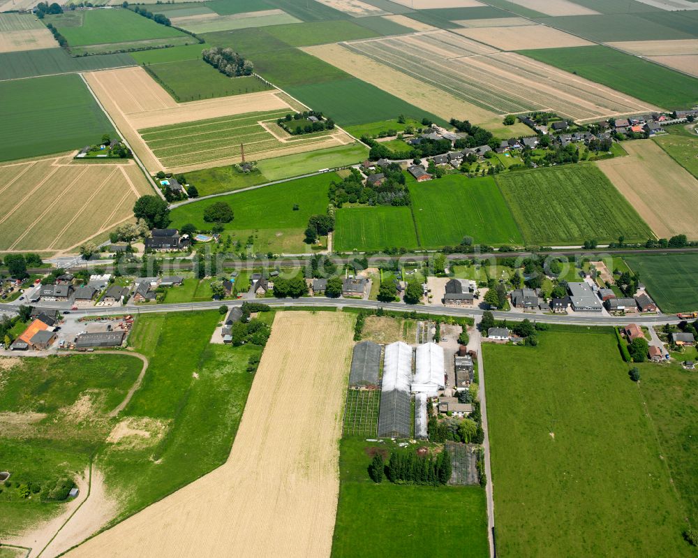 Aerial photograph Haldern - Agricultural land and field boundaries surround the settlement area of the village in Haldern in the state North Rhine-Westphalia, Germany