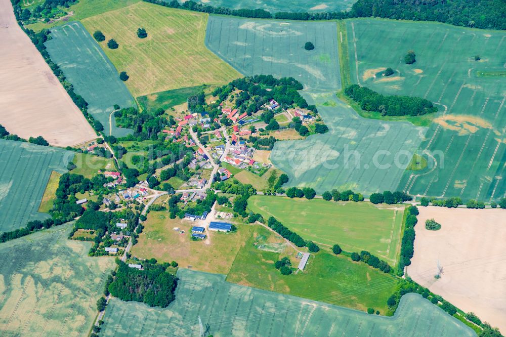 Halenbeck-Rohlsdorf from above - Agricultural land and field boundaries surround the settlement area of the village in Halenbeck-Rohlsdorf in the state Brandenburg, Germany