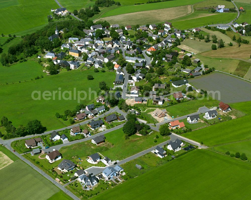 Hallerstein from the bird's eye view: Agricultural land and field boundaries surround the settlement area of the village in Hallerstein in the state Bavaria, Germany
