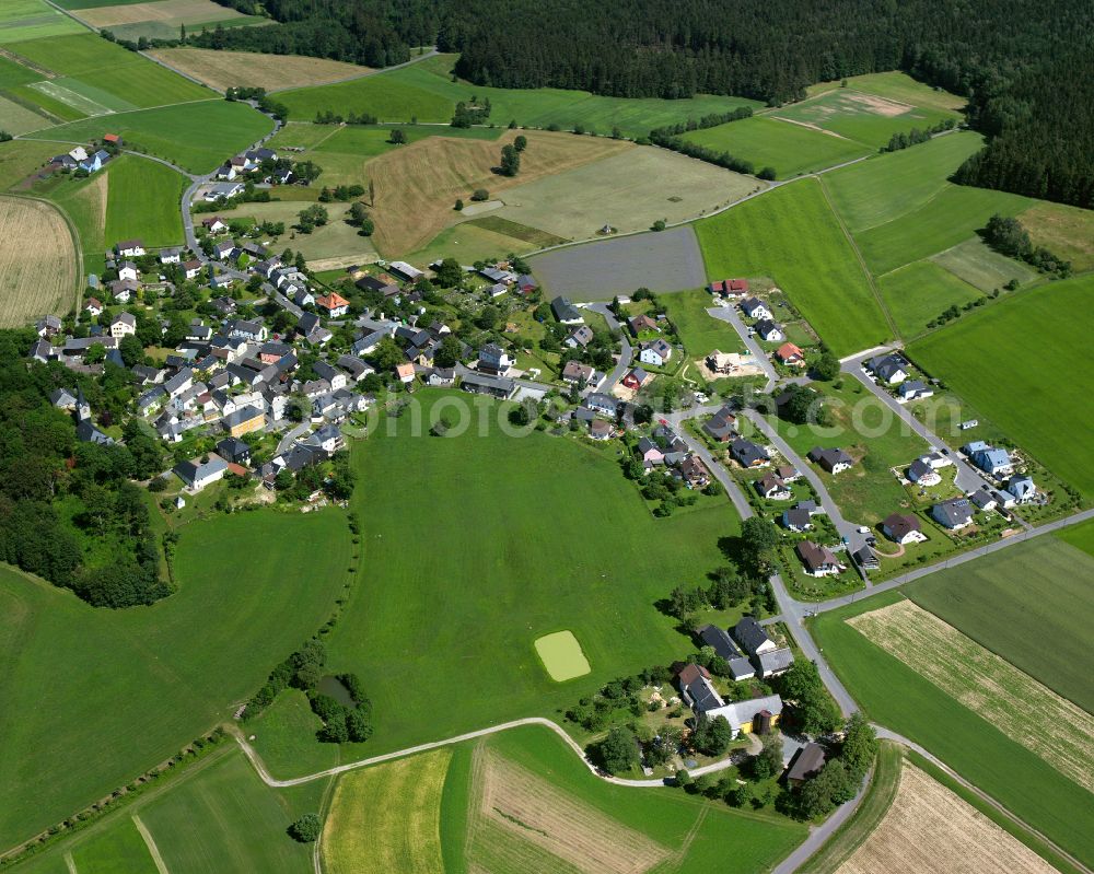 Aerial image Hallerstein - Agricultural land and field boundaries surround the settlement area of the village in Hallerstein in the state Bavaria, Germany