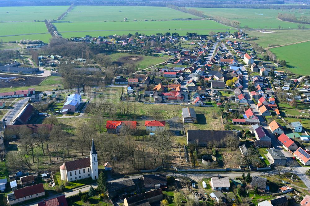 Aerial photograph Hammer - Agricultural land and field boundaries surround the settlement area of the village in Hammer in the state Brandenburg, Germany
