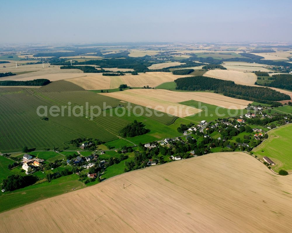 Aerial photograph Hartha - Agricultural land and field boundaries surround the settlement area of the village in Hartha in the state Saxony, Germany