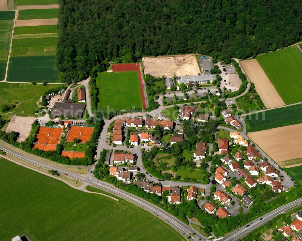 Hegnach from the bird's eye view: Agricultural land and field boundaries surround the settlement area of the village in Hegnach in the state Baden-Wuerttemberg, Germany