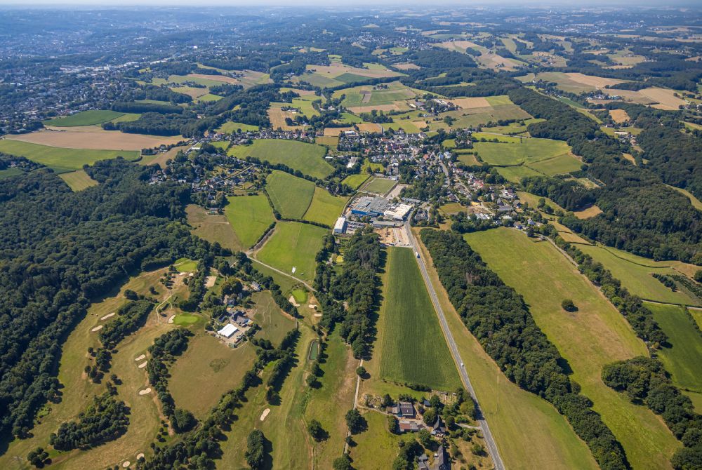 Herzkamp from above - Agricultural land and field boundaries surround the settlement area of the village in Herzkamp in the state North Rhine-Westphalia, Germany