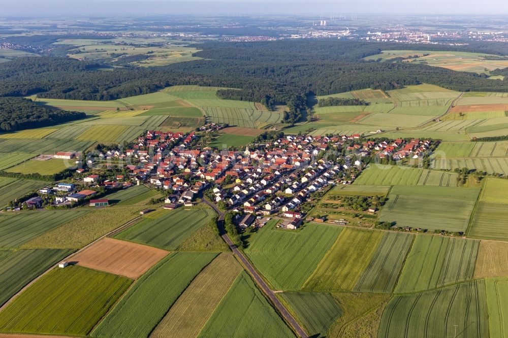 Aerial image Hesselbach - Agricultural land and field boundaries surround the settlement area of the village in Hesselbach in the state Bavaria, Germany