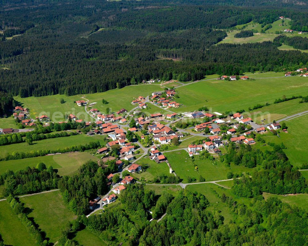 Höhenbrunn from above - Agricultural land and field boundaries surround the settlement area of the village in Höhenbrunn in the state Bavaria, Germany