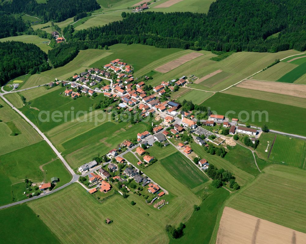 Aerial image Hintereben - Agricultural land and field boundaries surround the settlement area of the village in Hintereben in the state Bavaria, Germany