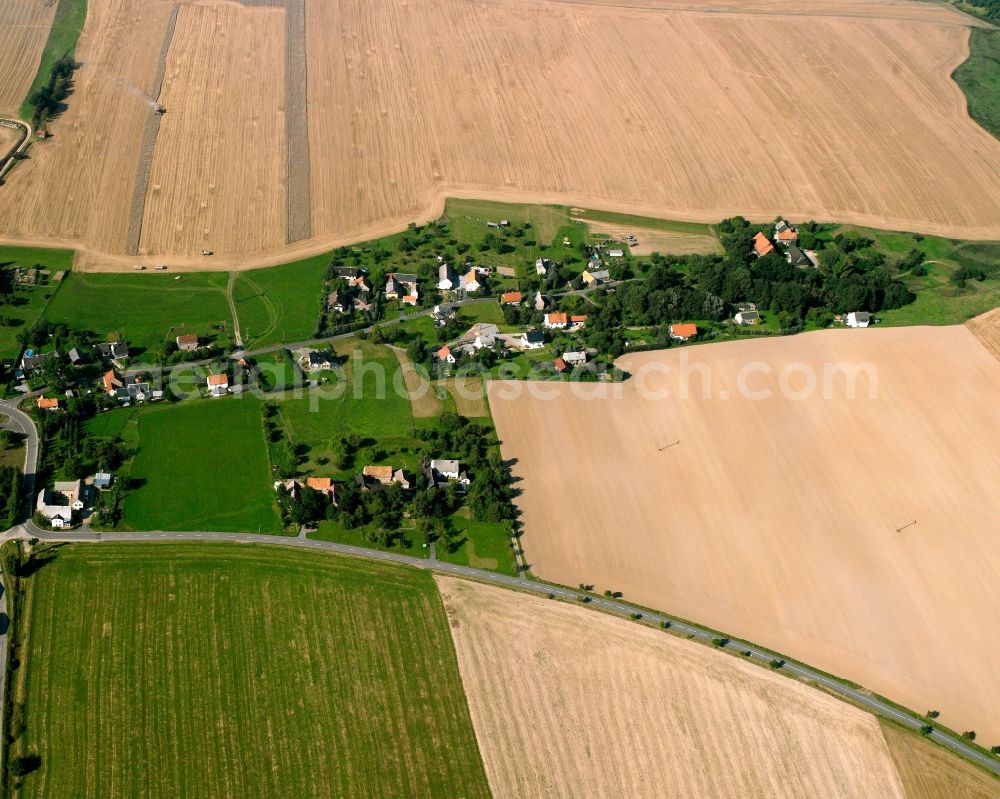 Aerial photograph Hirschfeld - Agricultural land and field boundaries surround the settlement area of the village in Hirschfeld in the state Saxony, Germany