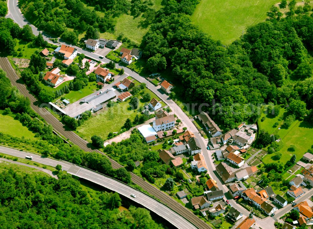 Hochstein from above - Agricultural land and field boundaries surround the settlement area of the village in Hochstein in the state Rhineland-Palatinate, Germany