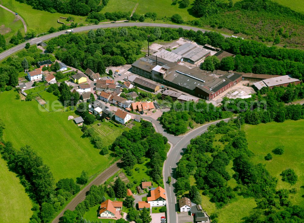Hochstein from above - Agricultural land and field boundaries surround the settlement area of the village in Hochstein in the state Rhineland-Palatinate, Germany