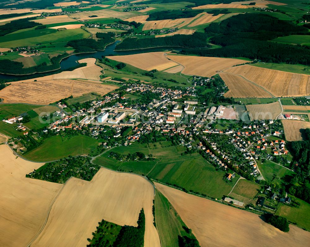 Hohenleuben from above - Agricultural land and field boundaries surround the settlement area of the village in Hohenleuben in the state Thuringia, Germany