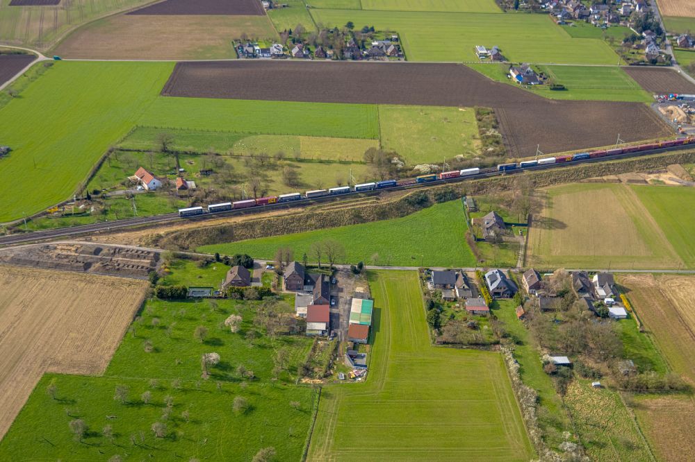 Aerial image Holthausen - Agricultural land and field boundaries surround the settlement area of the village in Holthausen in the state North Rhine-Westphalia, Germany