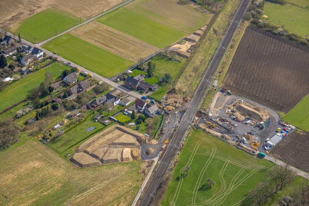 Aerial photograph Holthausen - Agricultural land and field boundaries surround the settlement area of the village in Holthausen in the state North Rhine-Westphalia, Germany