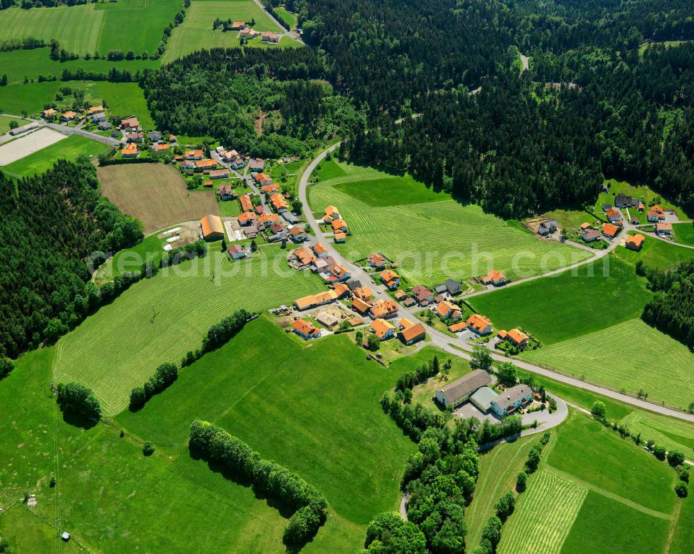 Holzfreyung from above - Agricultural land and field boundaries surround the settlement area of the village in Holzfreyung in the state Bavaria, Germany