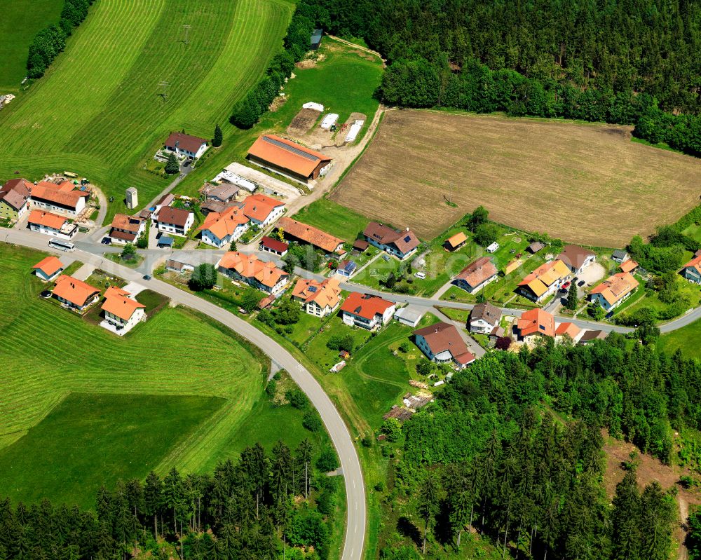 Holzfreyung from the bird's eye view: Agricultural land and field boundaries surround the settlement area of the village in Holzfreyung in the state Bavaria, Germany