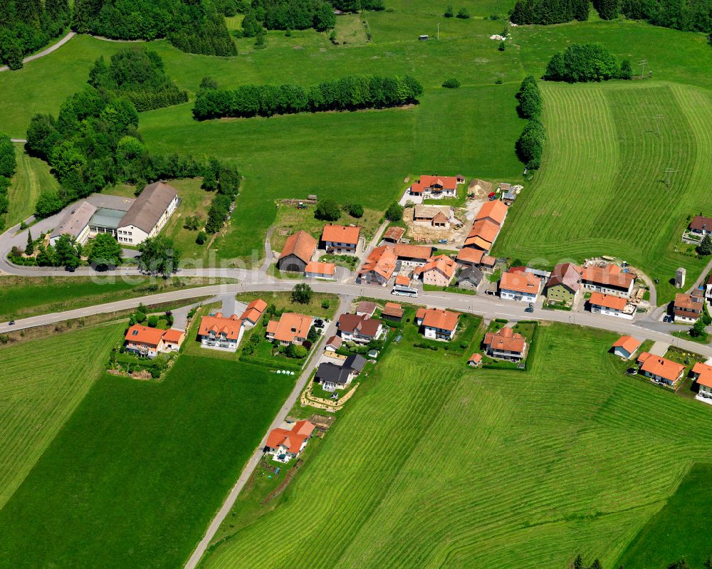 Aerial image Holzfreyung - Agricultural land and field boundaries surround the settlement area of the village in Holzfreyung in the state Bavaria, Germany