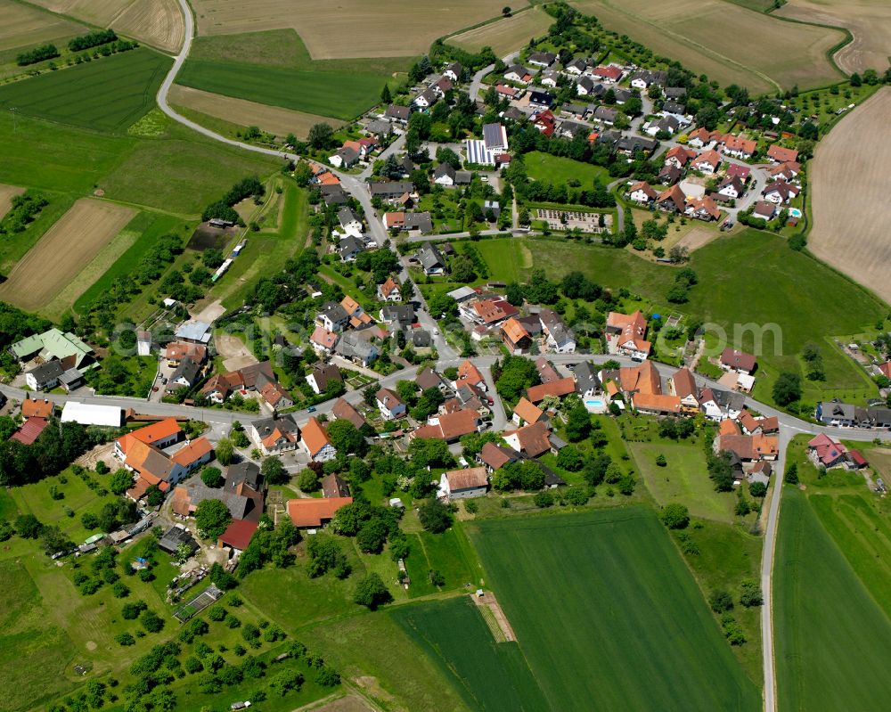 Aerial image Holzhausen - Agricultural land and field boundaries surround the settlement area of the village in Holzhausen in the state Baden-Wuerttemberg, Germany