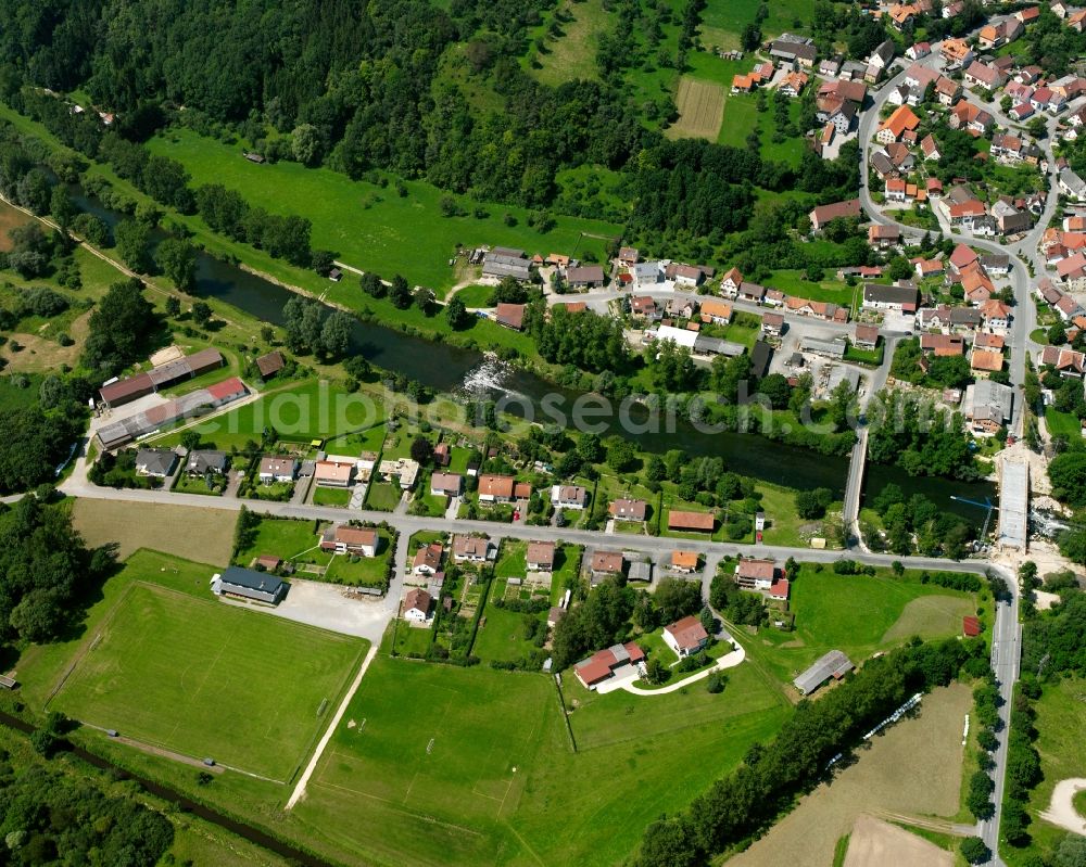 Hundersingen from the bird's eye view: Agricultural land and field boundaries surround the settlement area of the village in Hundersingen in the state Baden-Wuerttemberg, Germany