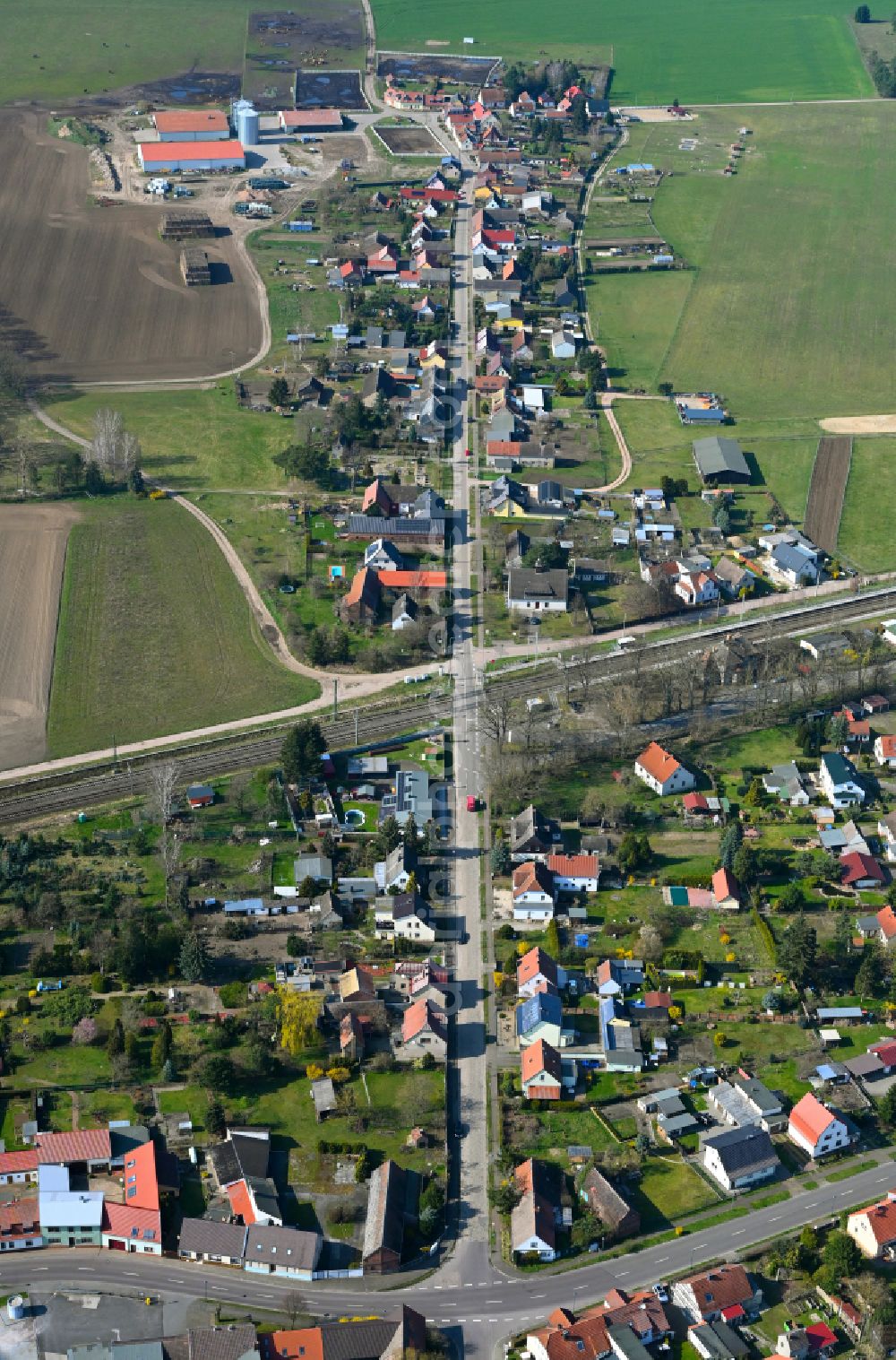 Jeber-Bergfrieden from above - Agricultural land and field boundaries surround the settlement area of the village in Jeber-Bergfrieden in the state Saxony-Anhalt, Germany