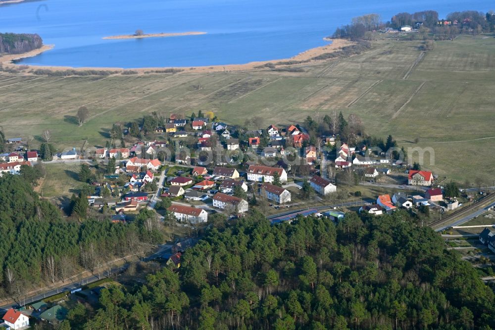 Joachimsthal from the bird's eye view: Agricultural land and field boundaries surround the settlement area of the village in Joachimsthal in the state Brandenburg, Germany