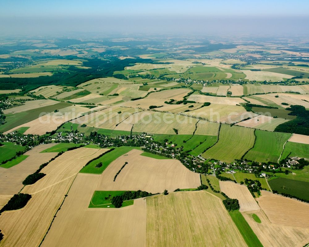 Kleinhartmannsdorf from above - Agricultural land and field boundaries surround the settlement area of the village in Kleinhartmannsdorf in the state Saxony, Germany