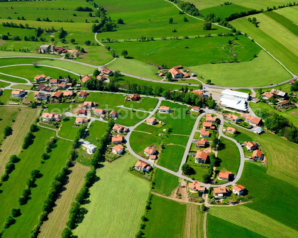 Aerial image Kreuzberg - Agricultural land and field boundaries surround the settlement area of the village in Kreuzberg in the state Bavaria, Germany