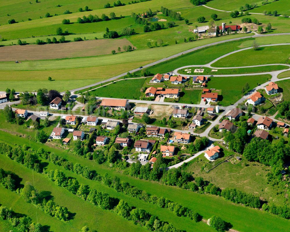 Aerial photograph Kreuzberg - Agricultural land and field boundaries surround the settlement area of the village in Kreuzberg in the state Bavaria, Germany