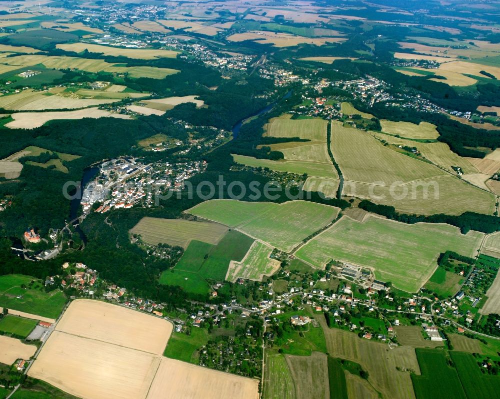 Aerial photograph Kriebethal - Agricultural land and field boundaries surround the settlement area of the village in Kriebethal in the state Saxony, Germany