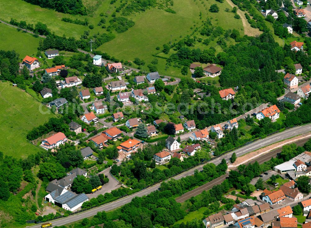 Kupferschmelz from above - Agricultural land and field boundaries surround the settlement area of the village in Kupferschmelz in the state Rhineland-Palatinate, Germany