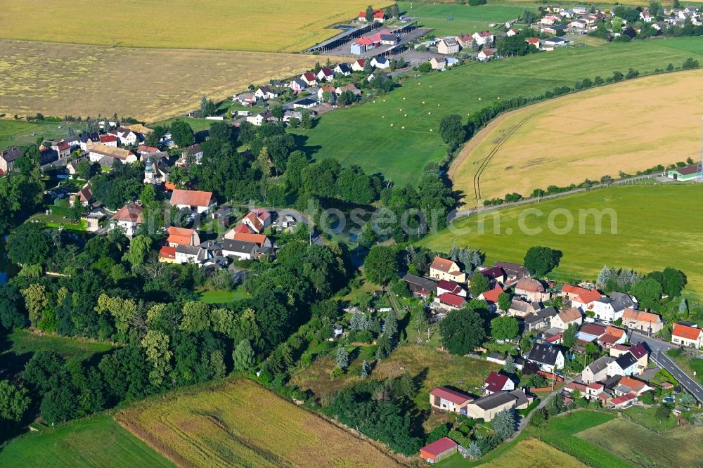 Aerial photograph Lampertswalde - Agricultural land and field boundaries surround the settlement area of the village in Lampertswalde in the state Saxony, Germany