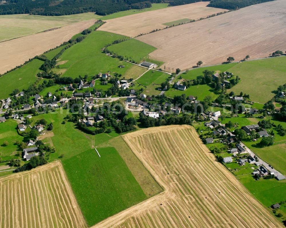 Aerial image Langenau - Agricultural land and field boundaries surround the settlement area of the village in Langenau in the state Saxony, Germany