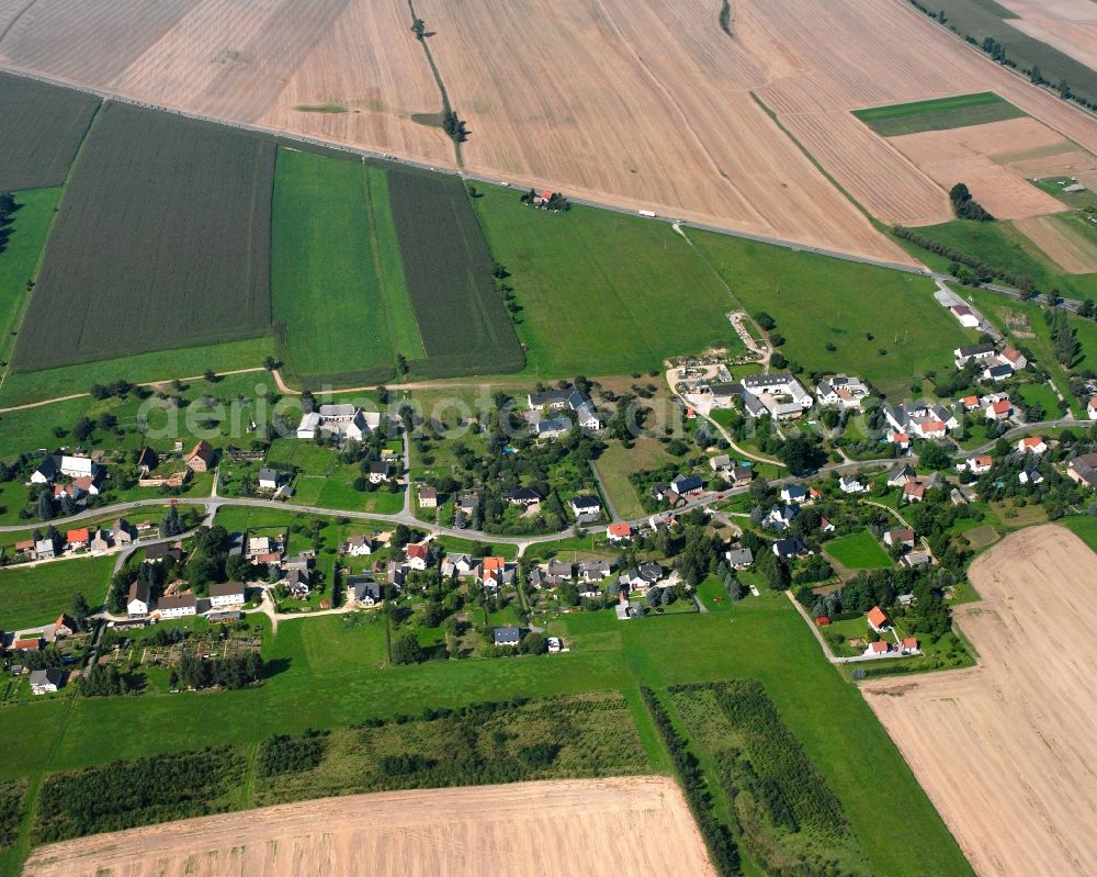 Langenleuba-Oberhain from the bird's eye view: Agricultural land and field boundaries surround the settlement area of the village in Langenleuba-Oberhain in the state Saxony, Germany