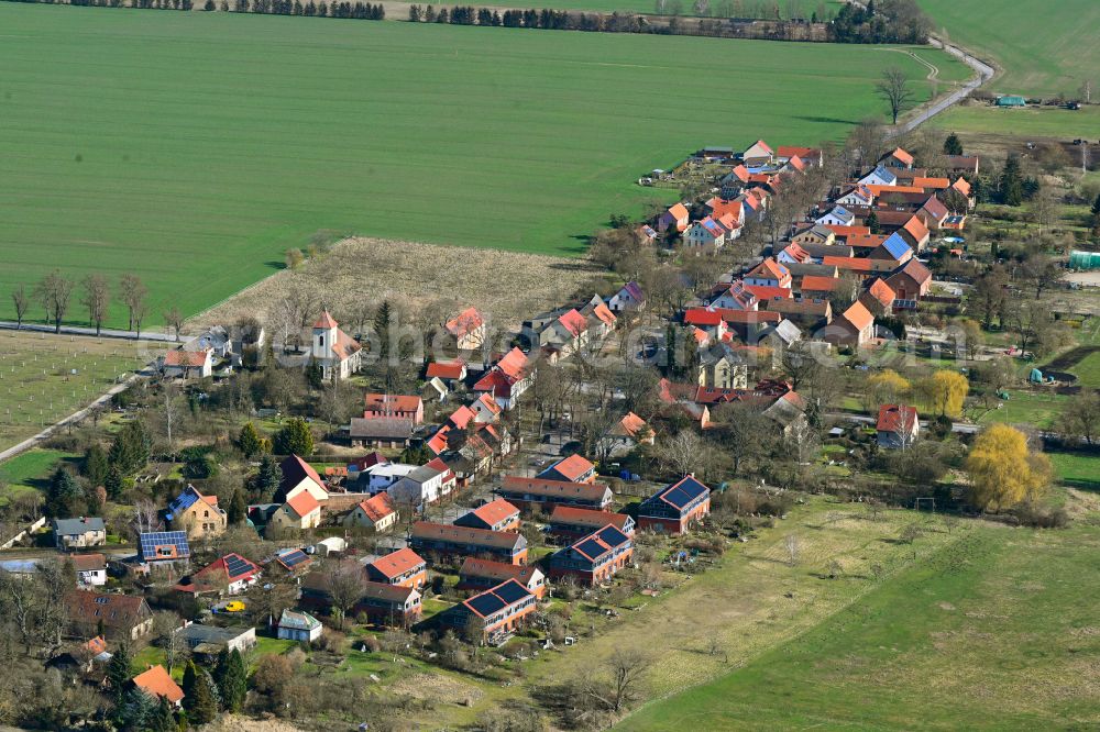 Langerwisch from above - Agricultural land and field boundaries surround the settlement area of the village on street Neu-Langerwisch in Langerwisch in the state Brandenburg, Germany