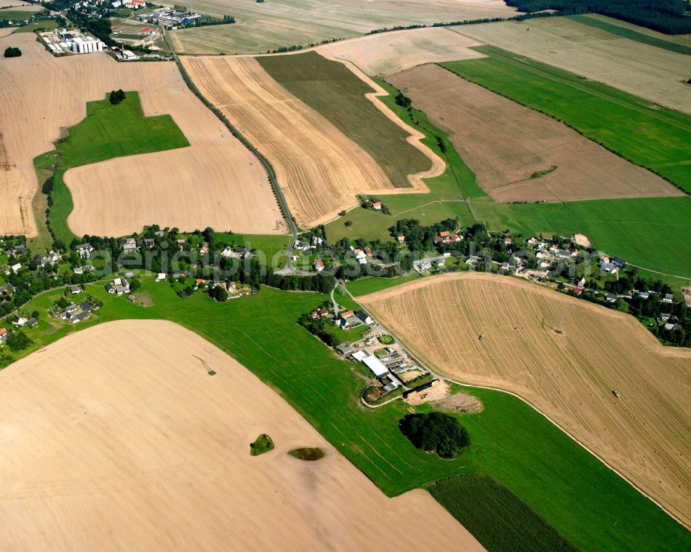 Aerial image Langhennersdorf - Agricultural land and field boundaries surround the settlement area of the village in Langhennersdorf in the state Saxony, Germany