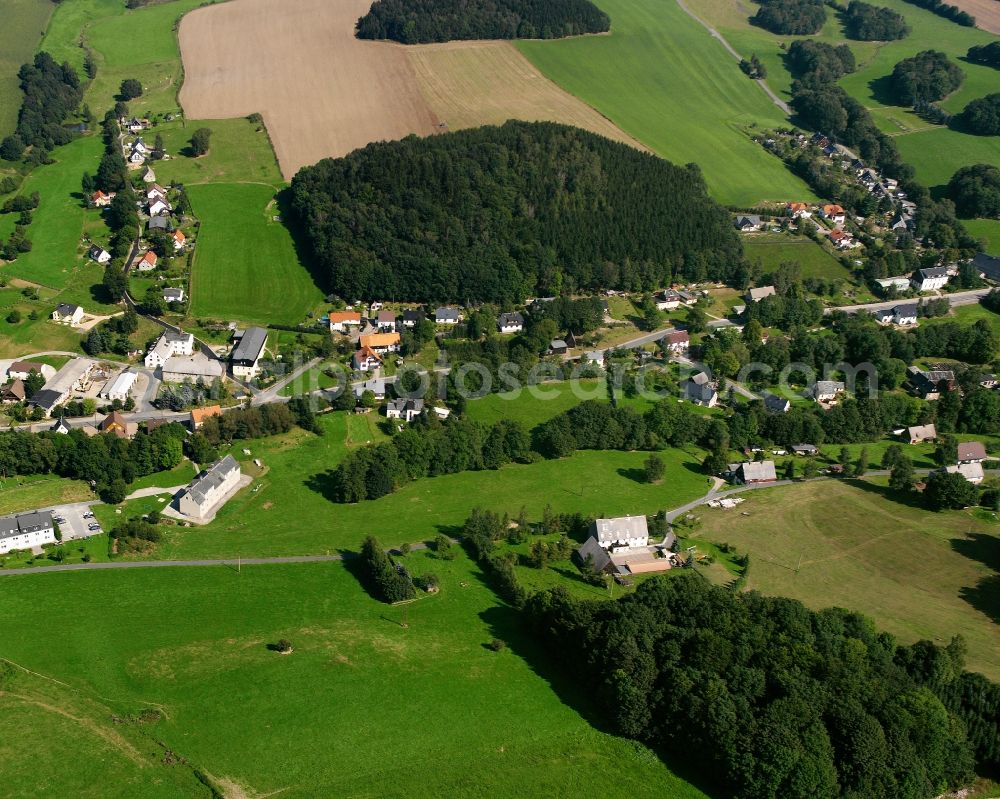 Aerial image Lichtenberg/Erzgebirge - Agricultural land and field boundaries surround the settlement area of the village in Lichtenberg/Erzgebirge in the state Saxony, Germany