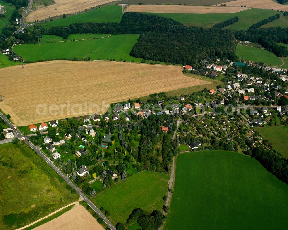 Lichtenwalde from above - Agricultural land and field boundaries surround the settlement area of the village in Lichtenwalde in the state Saxony, Germany