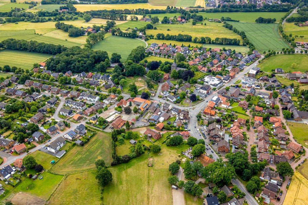 Aerial image Lippramsdorf - Agricultural land and field boundaries surround the settlement area of the village in Lippramsdorf in the state North Rhine-Westphalia, Germany