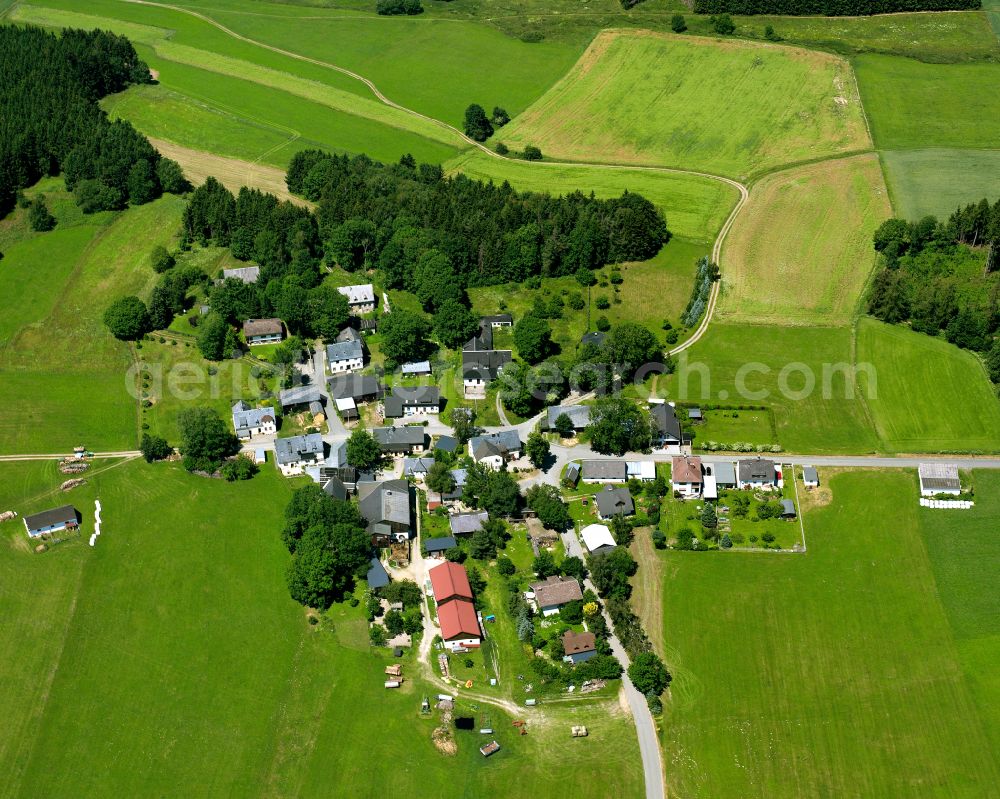 Aerial photograph Lochau - Agricultural land and field boundaries surround the settlement area of the village in Lochau in the state Bavaria, Germany