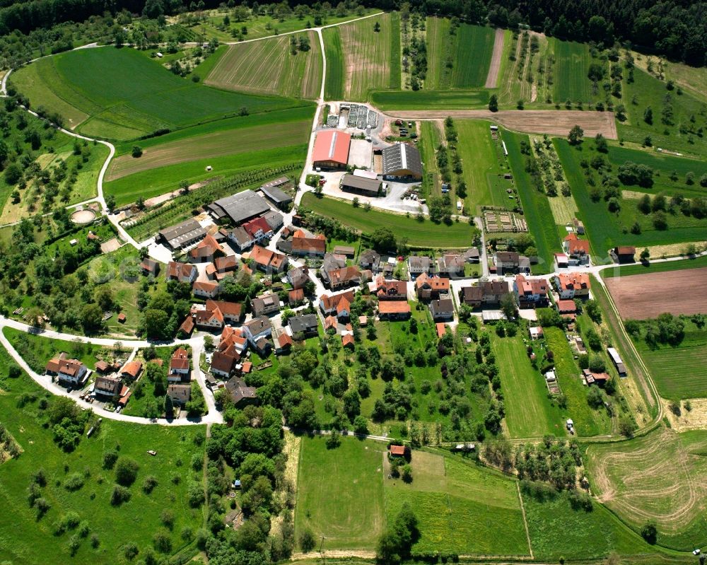 Aerial image Mannshaupten - Agricultural land and field boundaries surround the settlement area of the village in Mannshaupten in the state Baden-Wuerttemberg, Germany